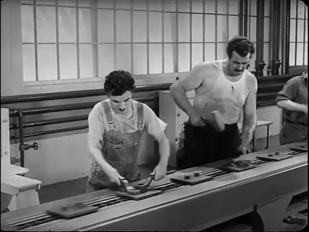 Charlie Chaplin on the assembly line in Modern Times